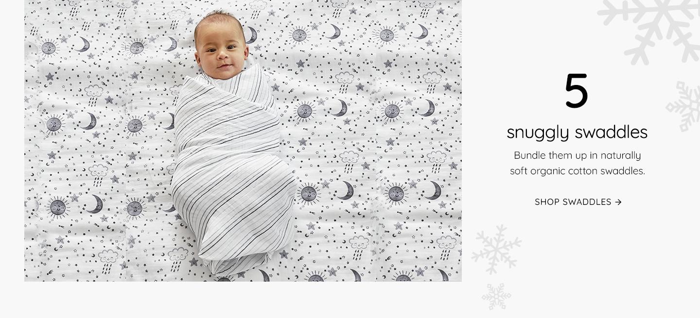 Snuggly Swaddles | Bundle them up in naturally soft rganic cotton swaddles in bright prints. | Shop Now